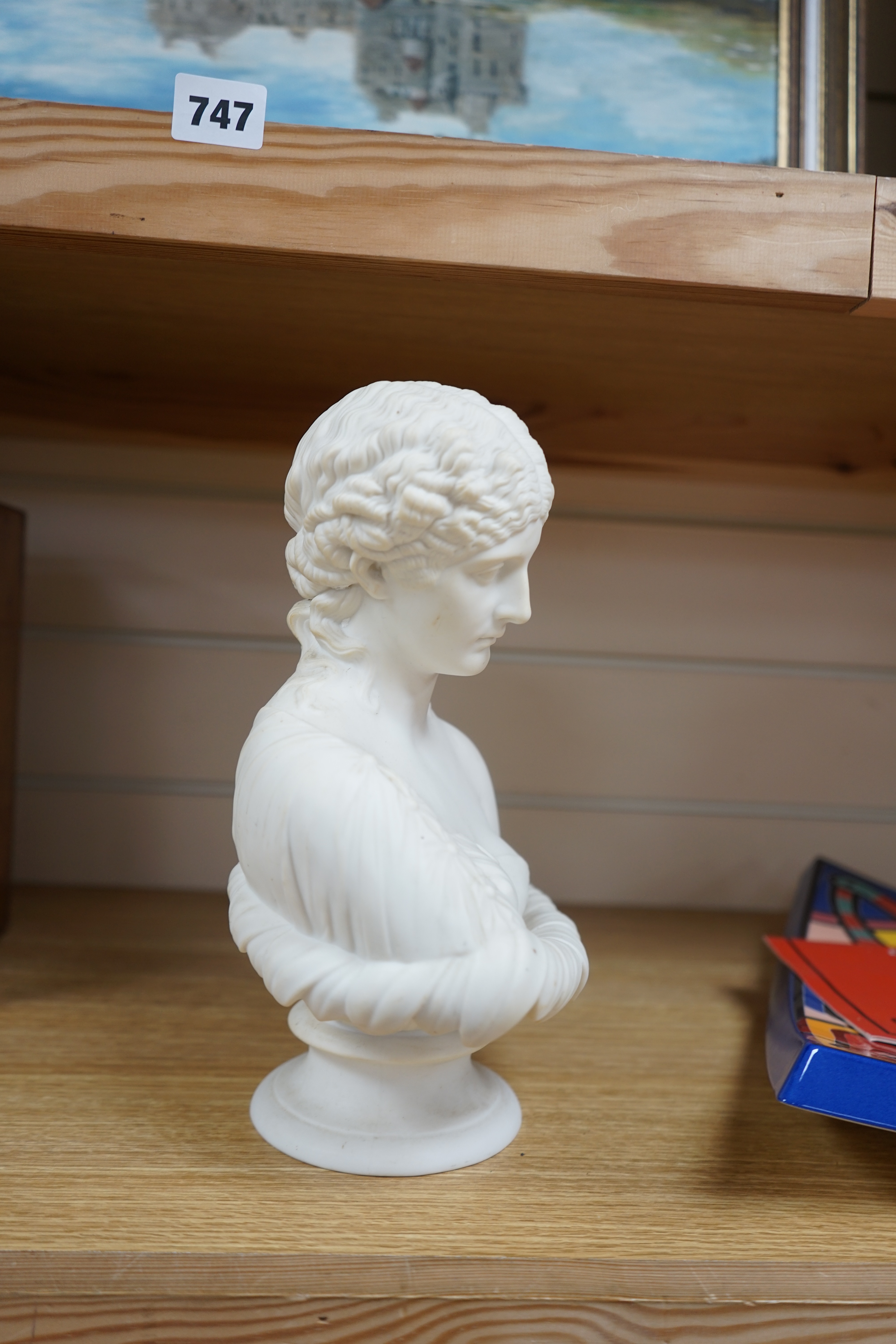 A Parianware bust of Clytie, 28cm high. Condition - good